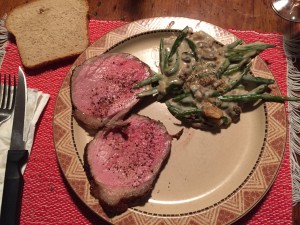 Green bean casserole with roast beef and  whole wheat bread