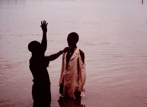 Michael Saki Baptising